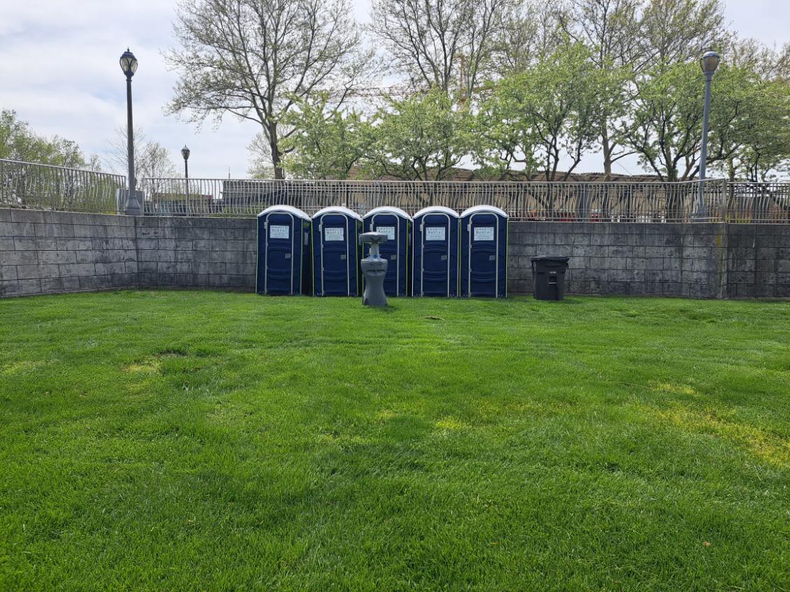 Summit City Rental fort wayne portable restrooms placed on one side of downtown Fort Wayne with a handwash station rental. 